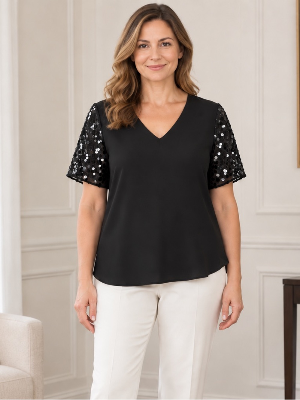 Donna Ricco black dressy blouse with sequins on sleeves. tailored shoulder pads